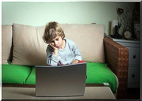 Lazy child in front of a computer