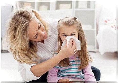 What causes a child's nosebleed and how is it treated?