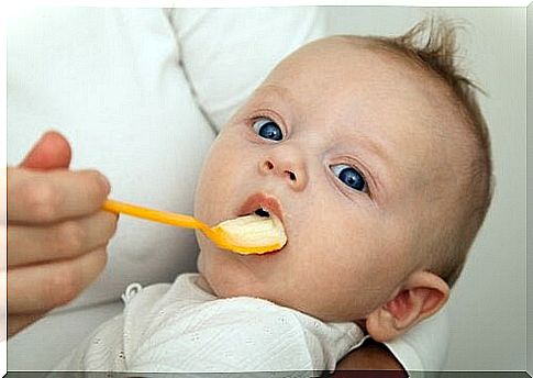 When and how is the baby given solid food?