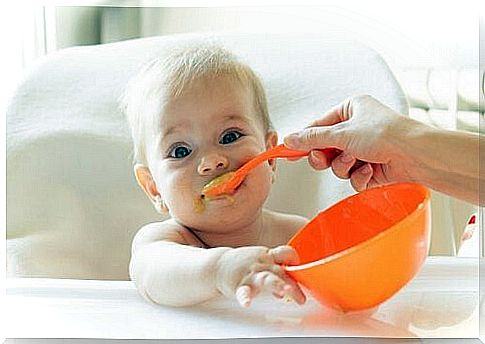 When and how is the baby given solid food?