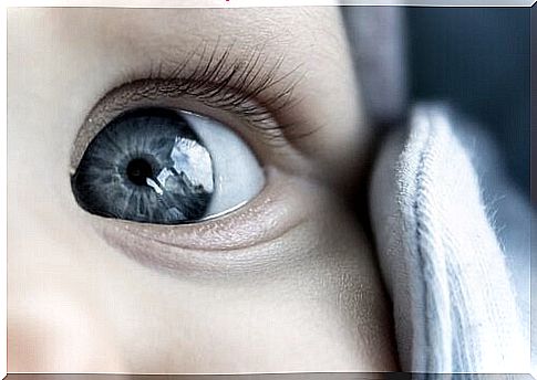 Why are babies born with blue or gray eyes?