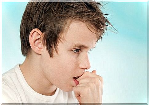 Why does a child chew his nails?